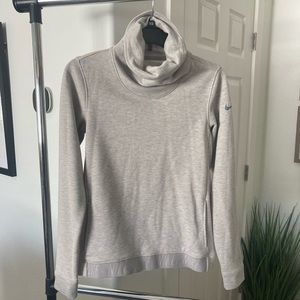 X-Small Nike sweatshirt. Grey/beige in color.